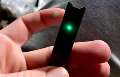 Check the LED light after inserting a JUULpod from a different package. . Juul blinking green 3 times
